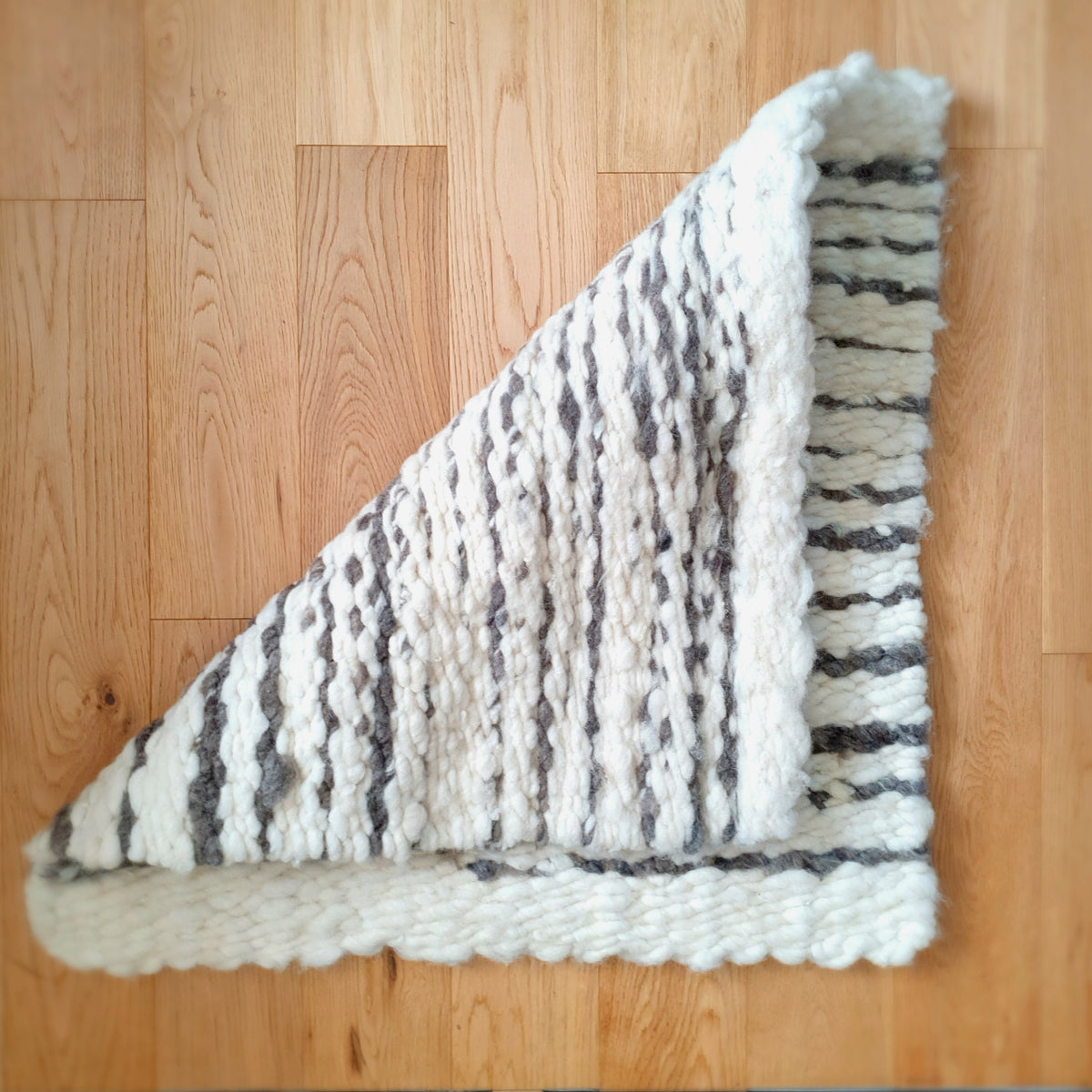 Striped carded wool rug