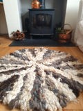 Round textured mixed romney wool rug
